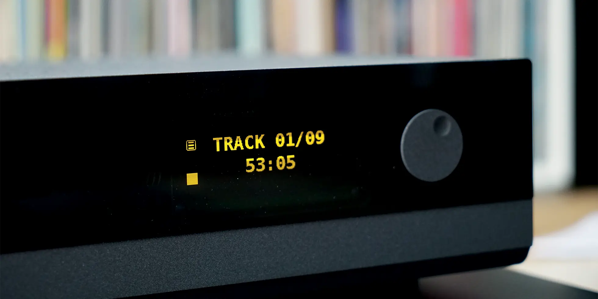 kora cd140 hifi cd player close-up on the screen reading "track 01/09 53:05" with the knob on the right