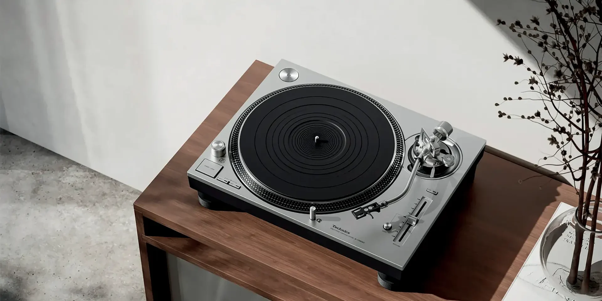 Technics SL-1200 GR2 hifi turntable elegant on a walnut table view from top