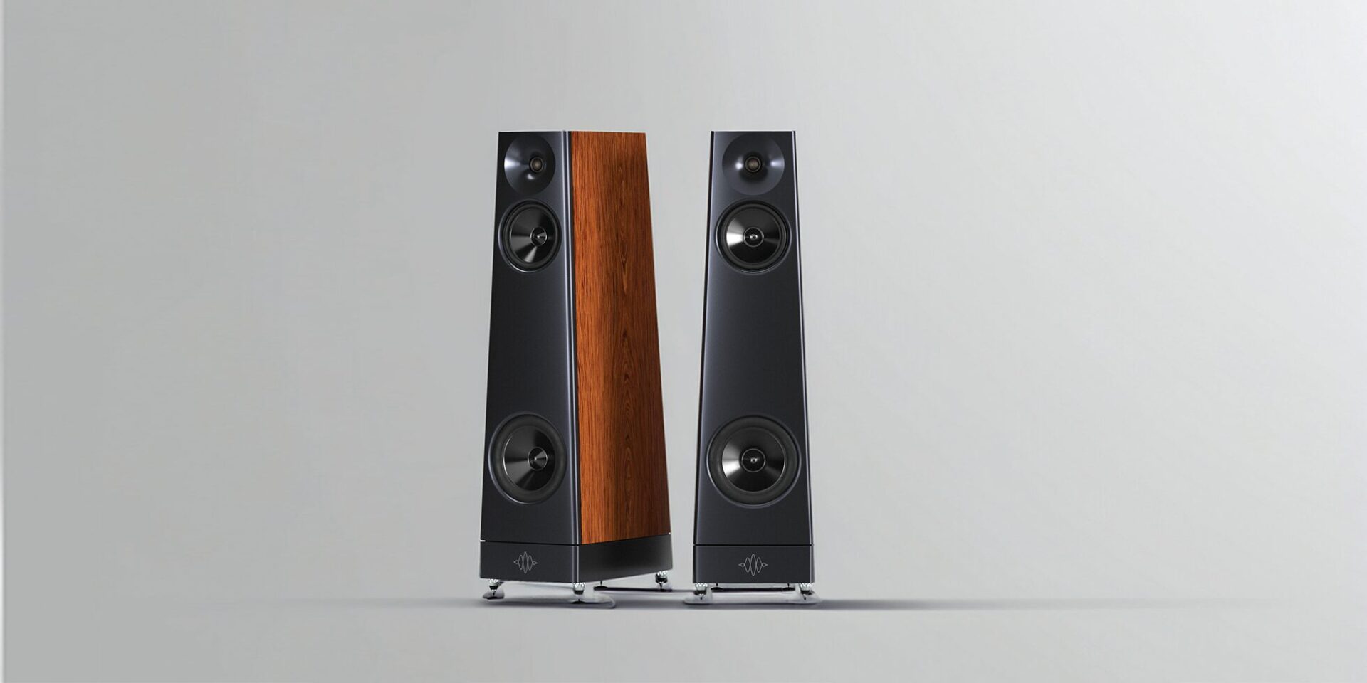 YG Acoustics Peak Ascent hifi loudspeakers black and wood model standing in a beige room, elegant picture