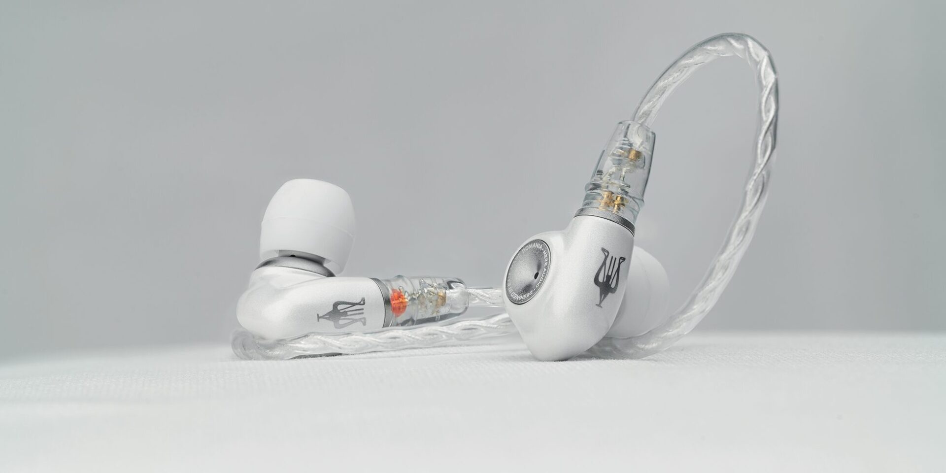 meze alba hifi earplugs on white linnen against white background