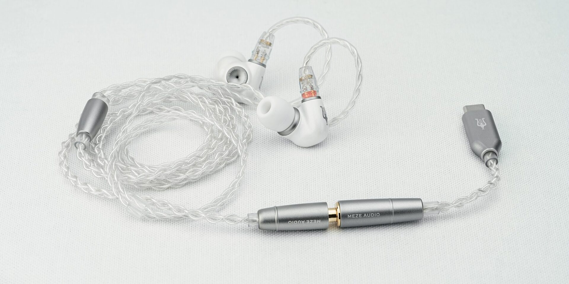 meze alba hifi earplugs on white linnen
